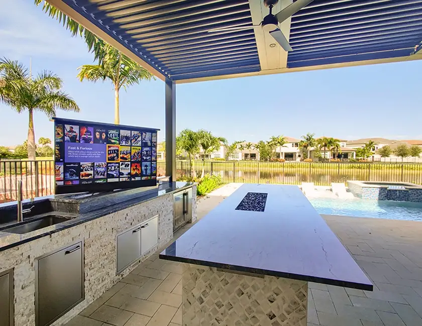 Automated-outdoor-kitchen-smart-backyard-smart-fans-swivel-mount-tv-controllable-pergola